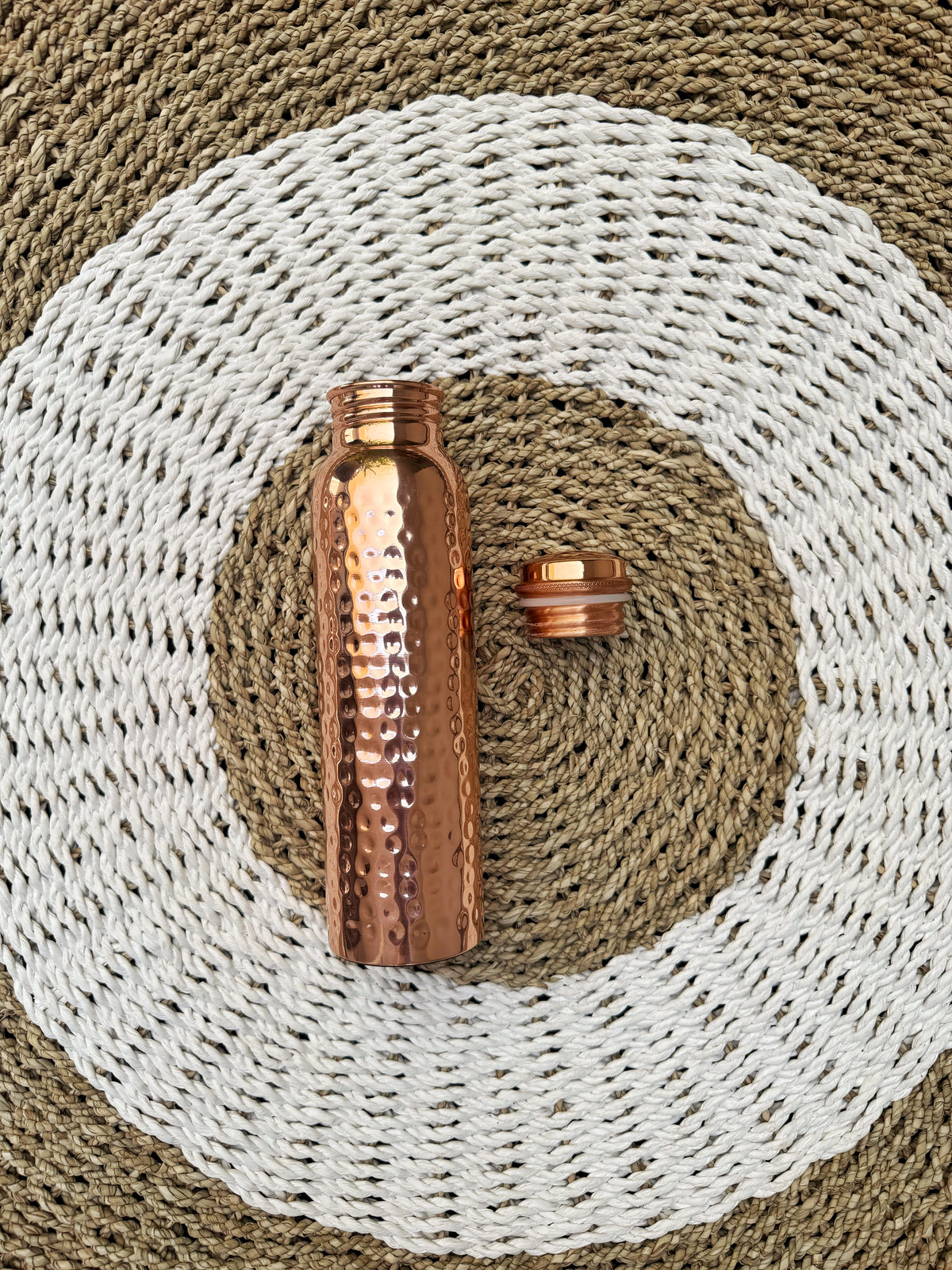 Crumpled gold pure copper bottle