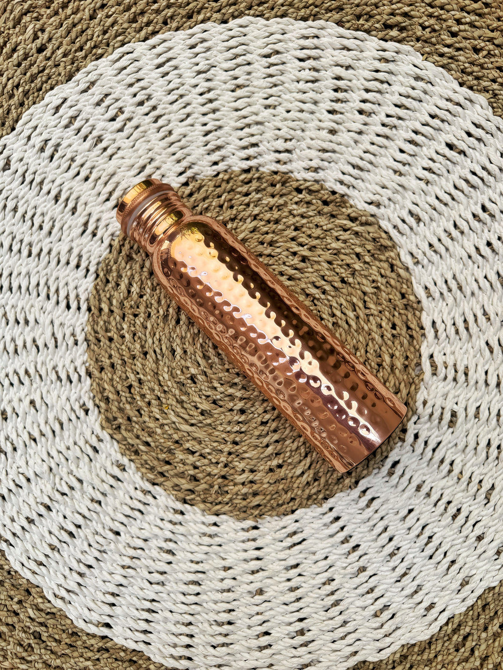 Crumpled gold pure copper bottle
