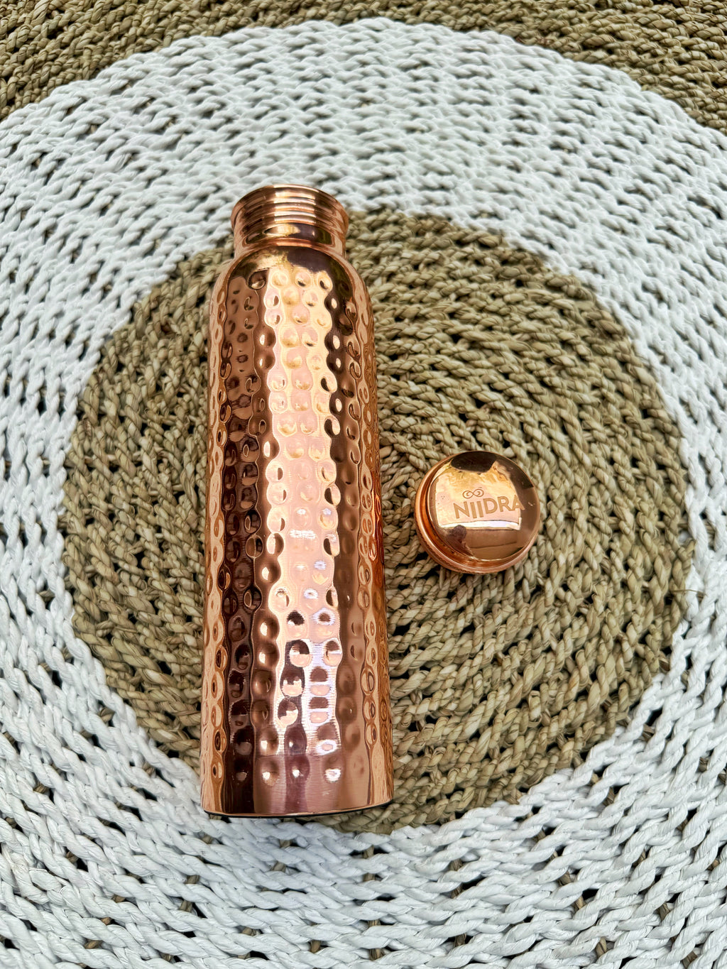 Crumpled gold pure copper bottle