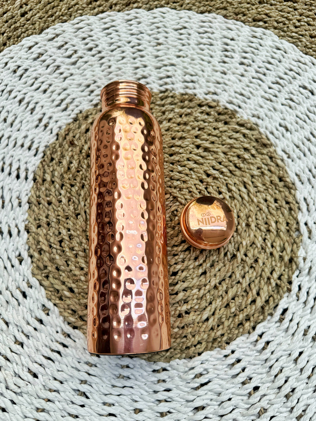 Crumpled gold pure copper bottle