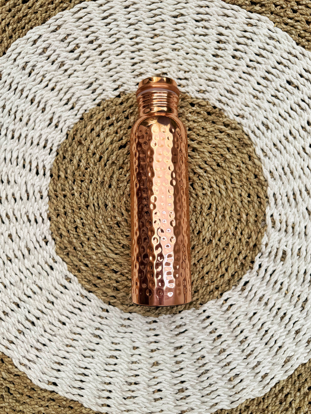 Crumpled gold pure copper bottle