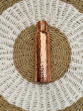 Crumpled gold pure copper bottle